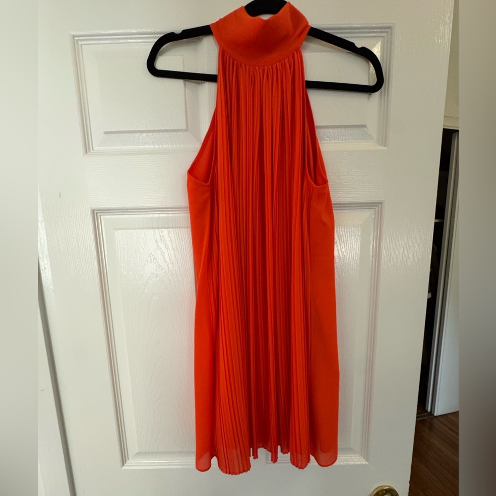 Vibrant sleeveless, orange cocktail dress